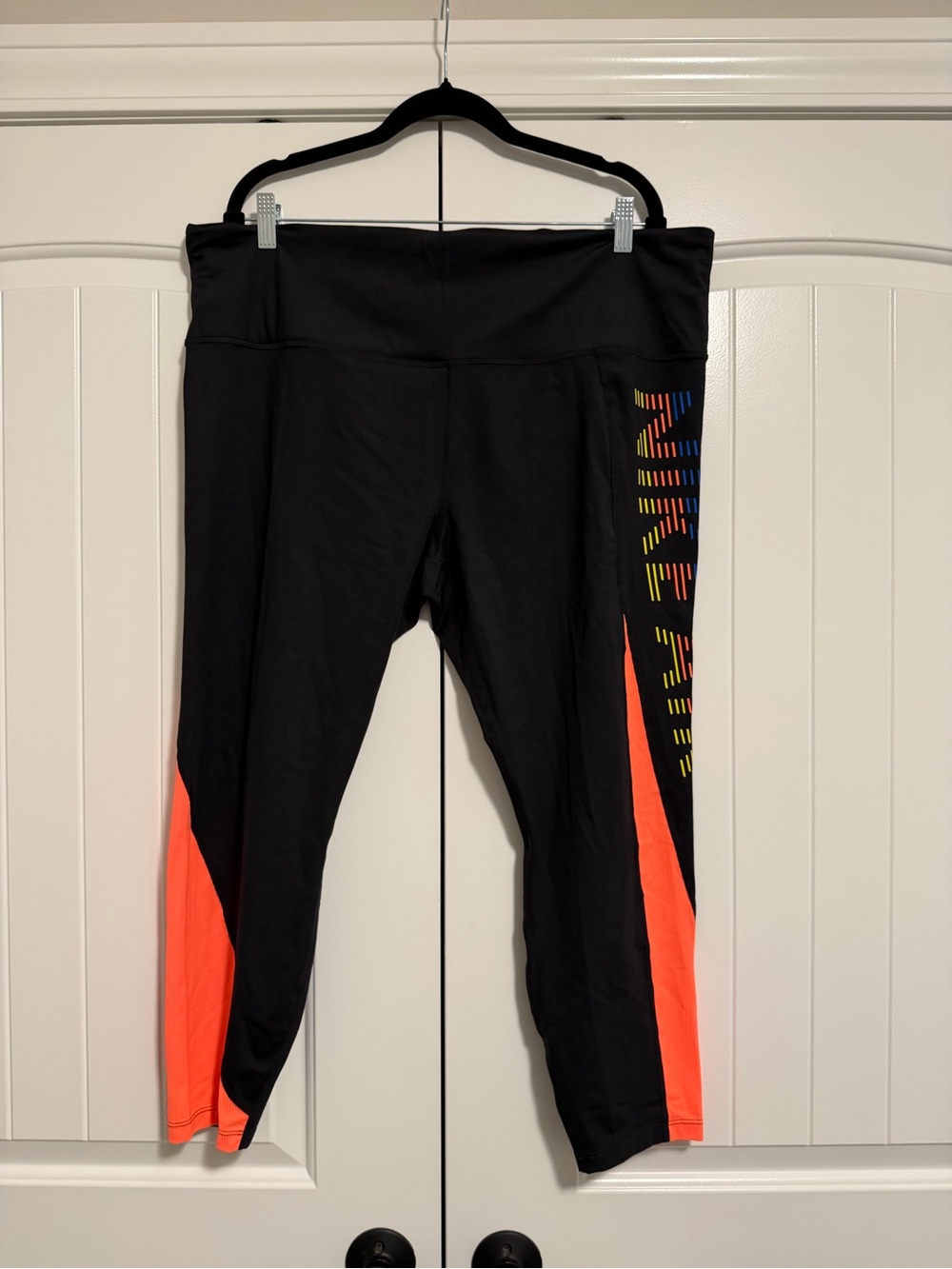 Nike Black Capri Leggings with Neon Coral Panels and Multicolor Side Detail